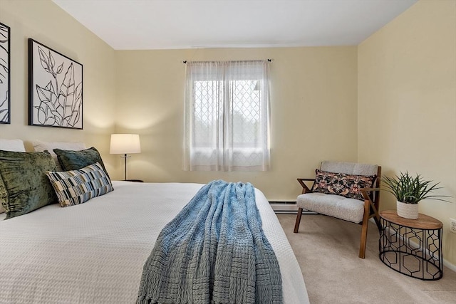 bedroom featuring carpet flooring, a baseboard radiator, and baseboards