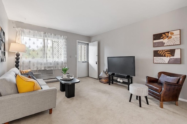 carpeted living area featuring a baseboard radiator