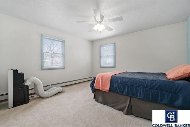 bedroom featuring a ceiling fan and carpet