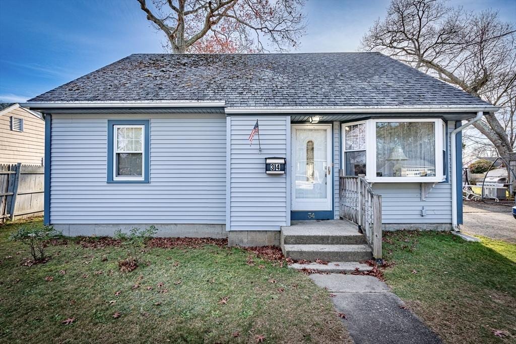 bungalow with a front yard