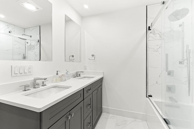 33 Sleeper St Unit 106, Boston, MA 02210 - full bath with marble finish floors, double vanity, enclosed tub / shower combo, and recessed lighting