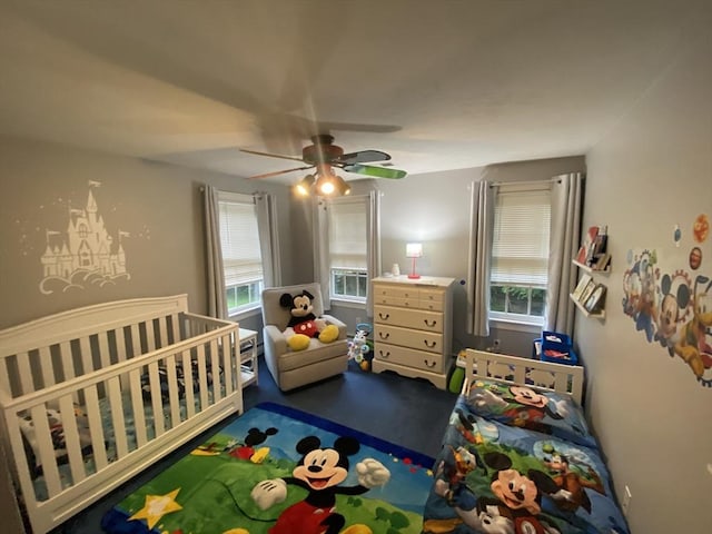 52 Cranberry Rd, Hanson, MA 02341 - bedroom featuring multiple windows, a ceiling fan, and a crib