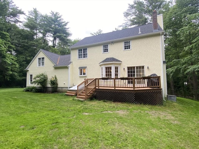 52 Cranberry Rd, Hanson, MA 02341 - back of house with a chimney, a yard, a wooden deck, and view of scattered trees
