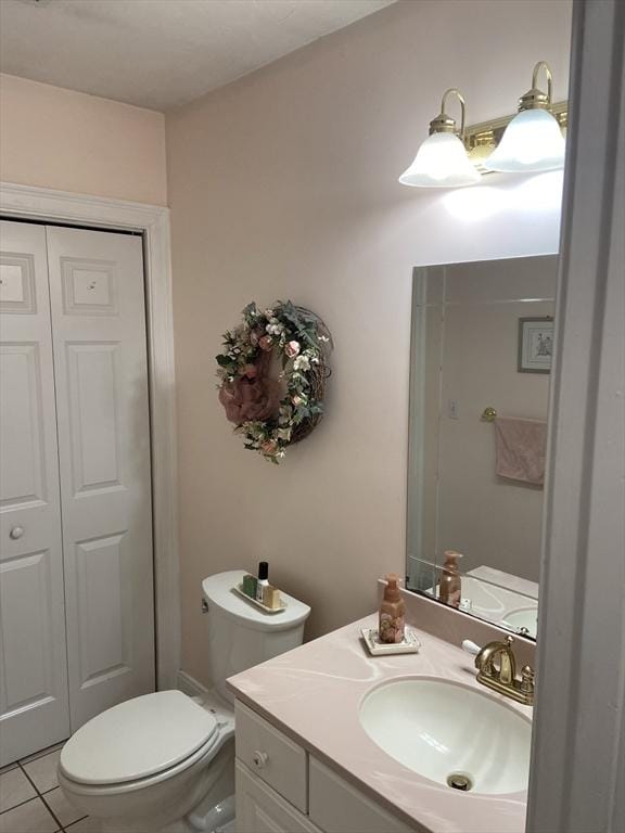 52 Cranberry Rd, Hanson, MA 02341 - bathroom featuring vanity, tile patterned flooring, and a closet
