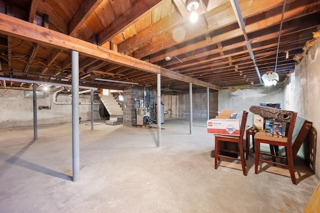 5 Northgate Rd, Chelmsford, MA 01824 - unfinished basement with stairs, water heater, and a heating unit