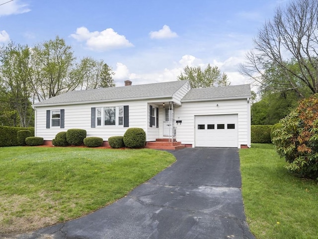 single story home with a garage, asphalt driveway, a chimney, a front lawn, and a shingled roof