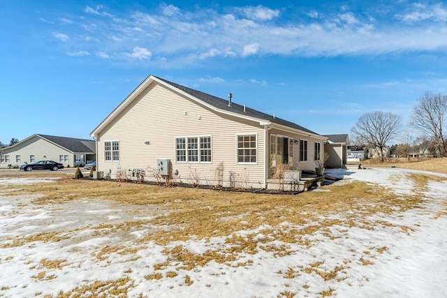 view of side of home with an attached garage