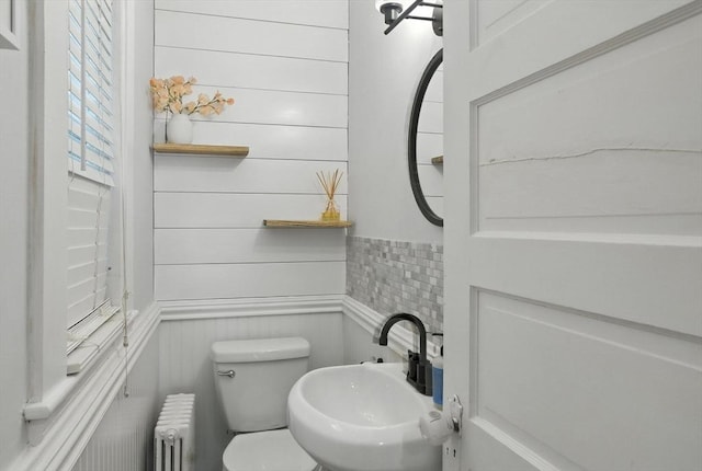 31 Dudley St, North Andover, MA 01845 - half bath with radiator and a wainscoted wall