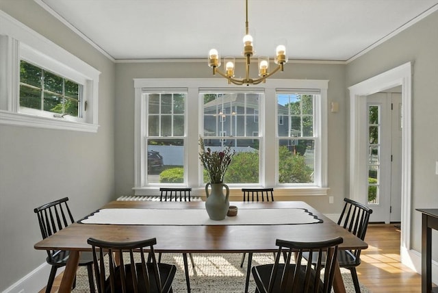31 Dudley St, North Andover, MA 01845 - dining room with a chandelier, light wood-type flooring, and ornamental molding