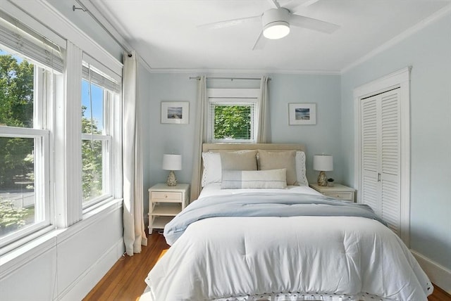 31 Dudley St, North Andover, MA 01845 - bedroom featuring crown molding, wood finished floors, ceiling fan, and a closet