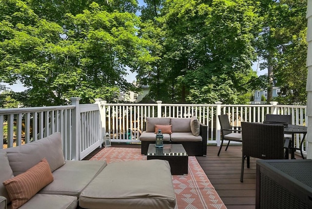31 Dudley St, North Andover, MA 01845 - wooden deck with an outdoor living space