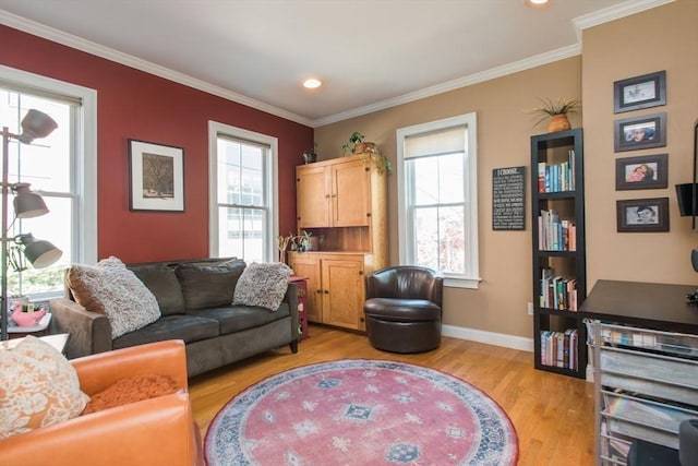 living area with crown molding, recessed lighting, baseboards, and light wood-type flooring