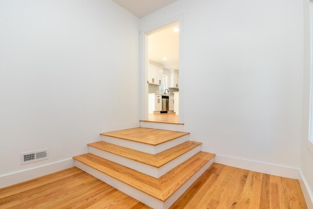 776 Allen St, Dartmouth, MA 02747 - stairway with wood finished floors