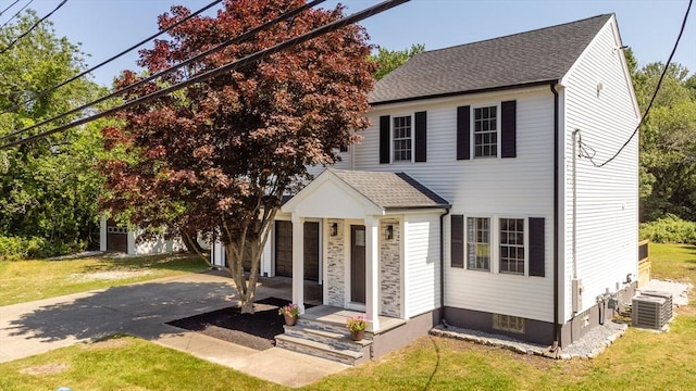 776 Allen St, Dartmouth, MA 02747 - view of front facade with driveway, a front yard, a garage, and roof with shingles