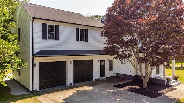 776 Allen St, Dartmouth, MA 02747 - view of front of house featuring a garage, a shingled roof, and concrete driveway