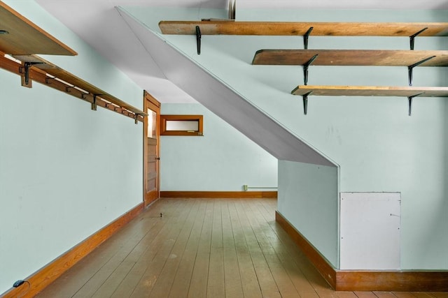 bonus room featuring hardwood / wood-style flooring