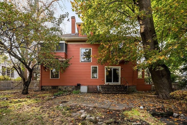 rear view of house featuring a patio