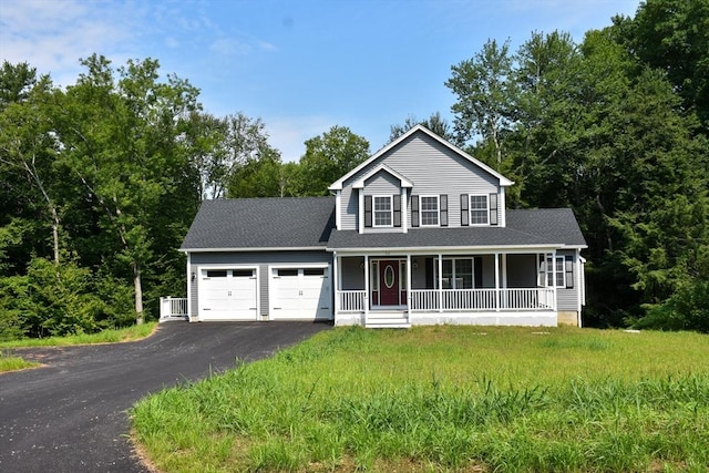 view of front of property featuring a garage, aphalt driveway, roof with shingles, covered porch, and cooling unit