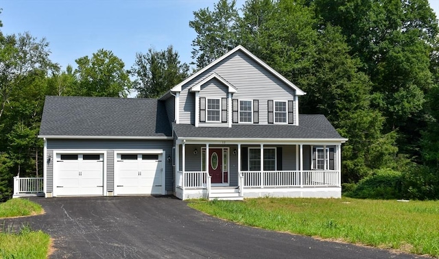 view of front of property featuring a garage, driveway, a shingled roof, and covered porch