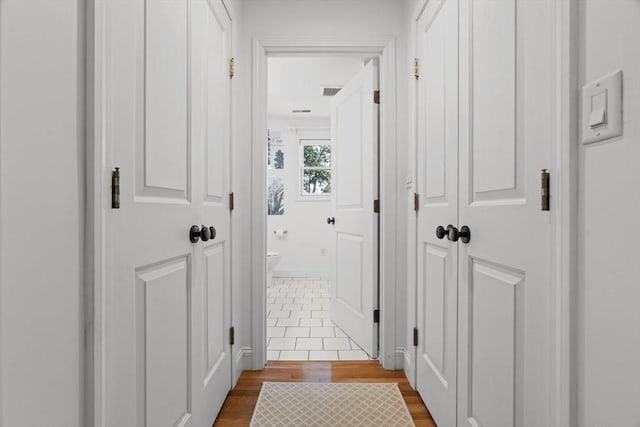 61 Colonial Dr, Arlington, MA 02474 - hall with dark wood-style flooring