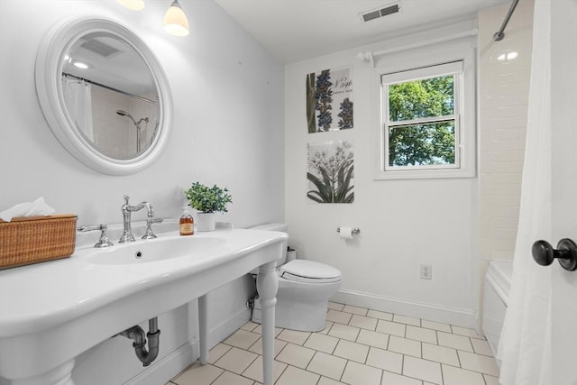 61 Colonial Dr, Arlington, MA 02474 - full bathroom featuring shower / bath combo with shower curtain and tile patterned flooring