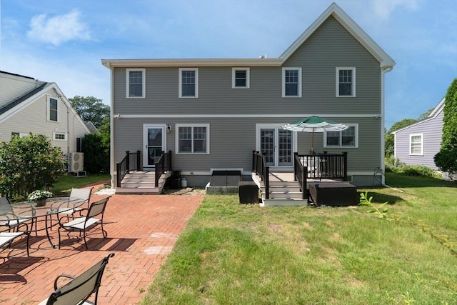 61 Colonial Dr, Arlington, MA 02474 - rear view of property with a patio area, a yard, and a wooden deck