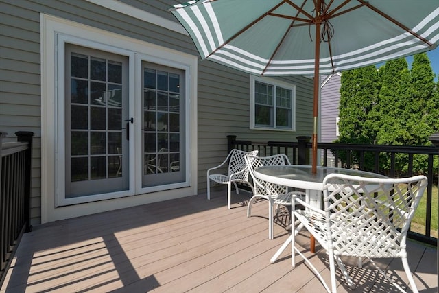 61 Colonial Dr, Arlington, MA 02474 - wooden deck with outdoor dining space and french doors