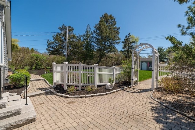view of gate featuring fence