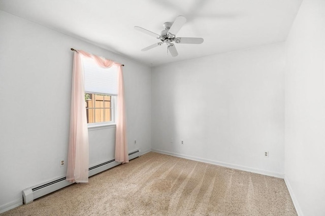 unfurnished room with baseboards, a ceiling fan, and light carpet