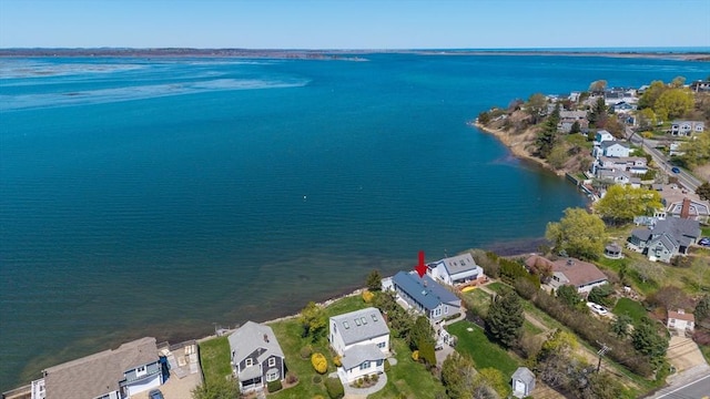 bird's eye view with a water view and a residential view