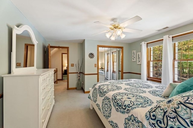 13 Lisa Ln, Georgetown, MA 01833 - bedroom with light carpet, baseboards, a closet, and a ceiling fan