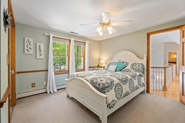 13 Lisa Ln, Georgetown, MA 01833 - bedroom with carpet floors, a baseboard radiator, a ceiling fan, and baseboards