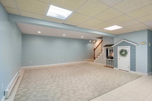 13 Lisa Ln, Georgetown, MA 01833 - finished basement with a baseboard radiator, carpet flooring, stairs, baseboards, and recessed lighting