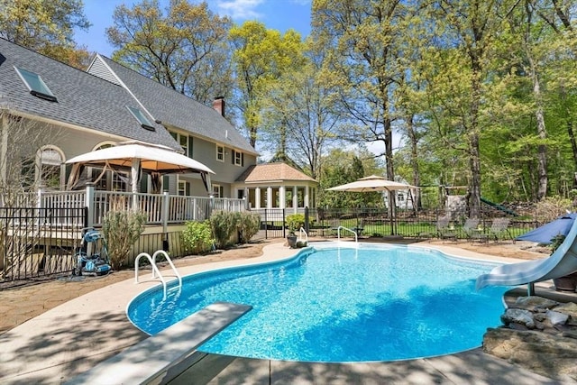 13 Lisa Ln, Georgetown, MA 01833 - view of pool with a water slide, a gazebo, and a patio