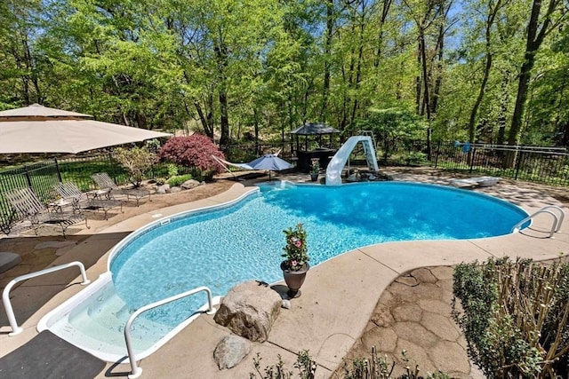 13 Lisa Ln, Georgetown, MA 01833 - view of swimming pool featuring a water slide and a patio