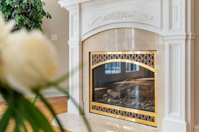 13 Lisa Ln, Georgetown, MA 01833 - detailed view of baseboards, decorative columns, and a premium fireplace