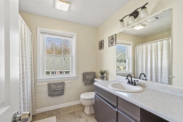 51 Fox Meadow Rd Unit A, Leominster, MA 01453 - full bath featuring vanity, baseboards, toilet, and tile patterned flooring