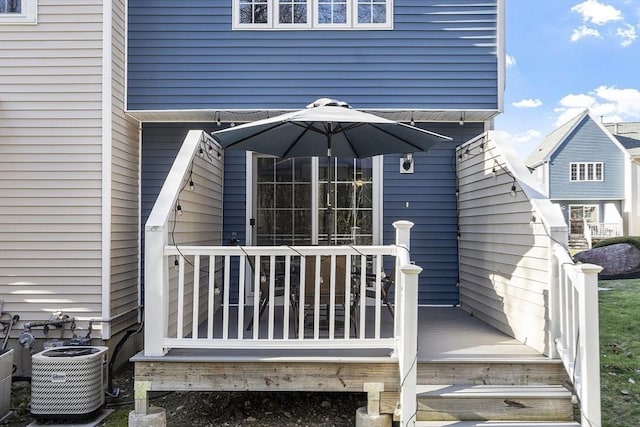 51 Fox Meadow Rd Unit A, Leominster, MA 01453 - rear view of property featuring central air condition unit and a deck