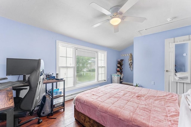 18 Cannongate Rd Unit 68, Tyngsborough, MA 01879 - bedroom featuring attic access, dark wood finished floors, vaulted ceiling, a desk, and a baseboard heating unit