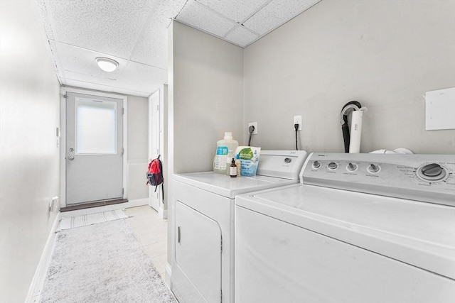 18 Cannongate Rd Unit 68, Tyngsborough, MA 01879 - washroom with washing machine and dryer, baseboards, and light tile patterned flooring