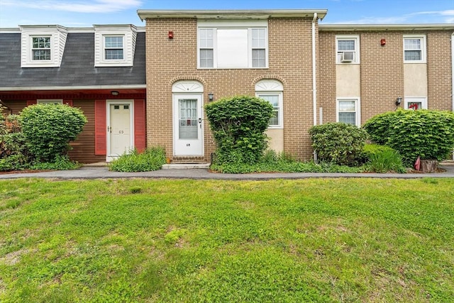 18 Cannongate Rd Unit 68, Tyngsborough, MA 01879 - multi unit property with a front yard, brick siding, and a shingled roof