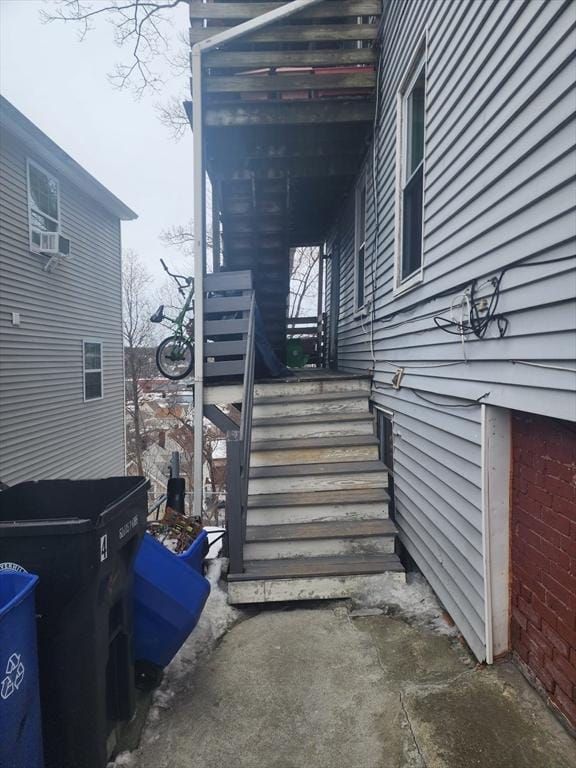 view of side of home with cooling unit