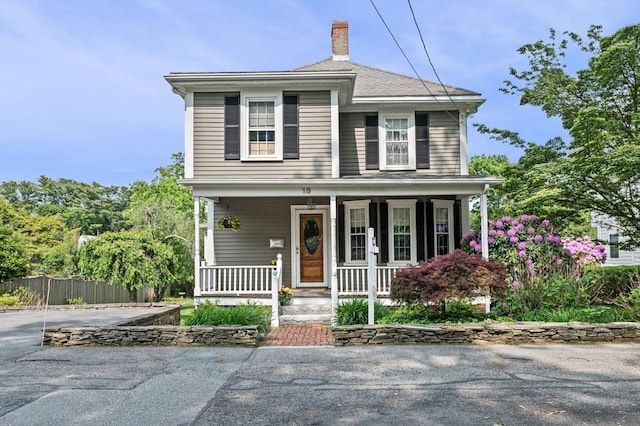 18 E St, Beverly, MA 01915 - view of front of home with a chimney and covered porch