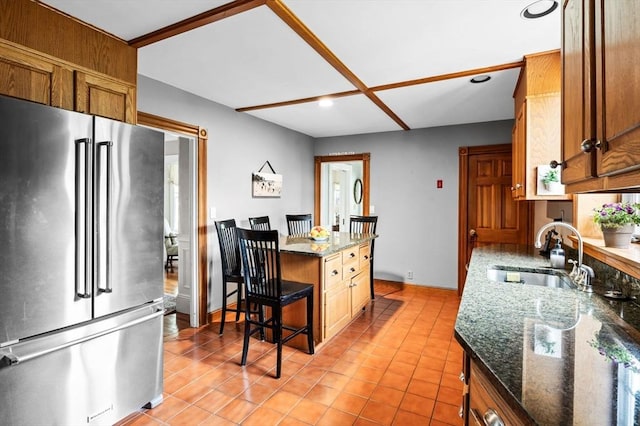 18 E St, Beverly, MA 01915 - kitchen featuring high end refrigerator, a sink, baseboards, light tile patterned flooring, and recessed lighting
