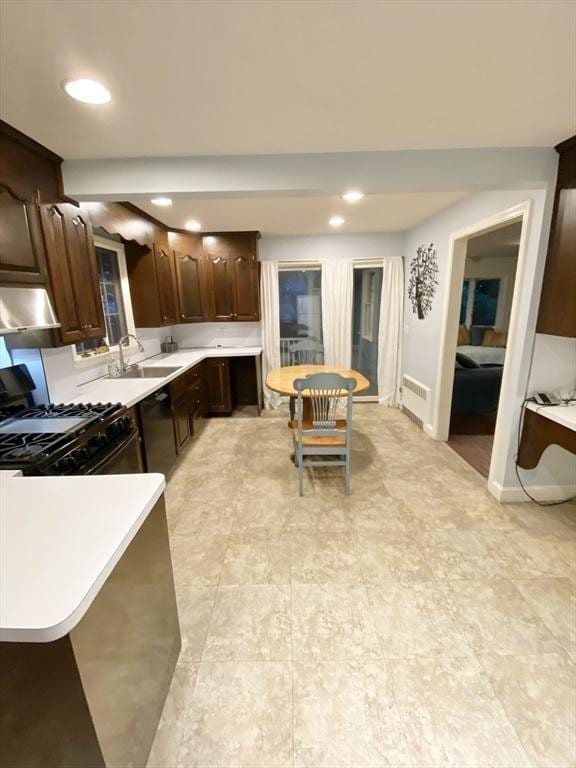 54 Hilltop St, Quincy, MA 02169 - kitchen with black appliances, light countertops, dark brown cabinets, a sink, and recessed lighting