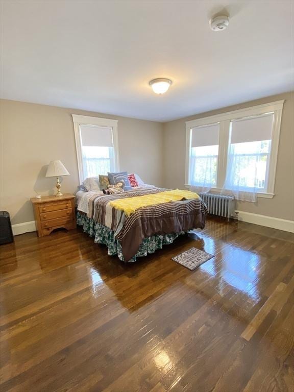 54 Hilltop St, Quincy, MA 02169 - bedroom featuring radiator heating unit, wood finished floors, and baseboards