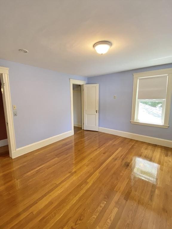 54 Hilltop St, Quincy, MA 02169 - unfurnished room with wood finished floors and baseboards
