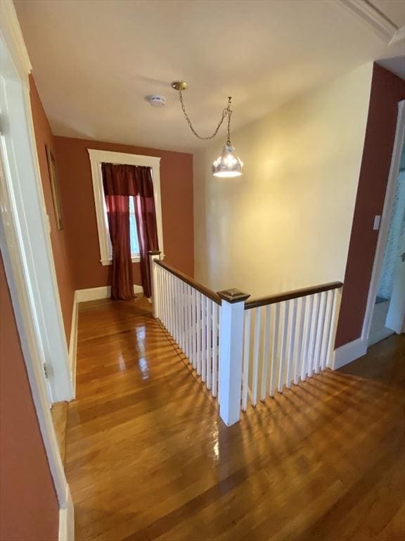 54 Hilltop St, Quincy, MA 02169 - corridor with an upstairs landing, wood finished floors, baseboards, and attic access
