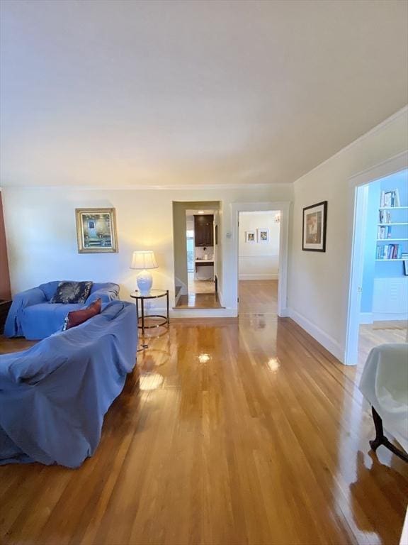 54 Hilltop St, Quincy, MA 02169 - living room featuring light wood-style flooring and baseboards