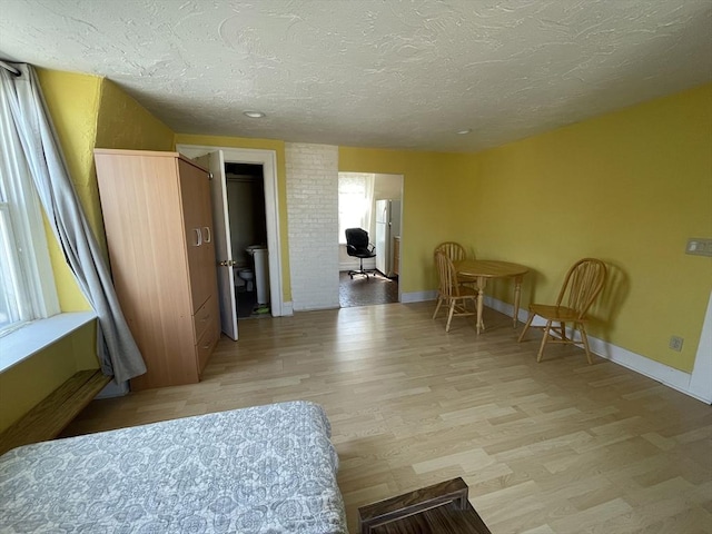 74 Newhall Unit 9, Lynn, MA 01902 - living area featuring a textured ceiling, light wood-style flooring, and baseboards